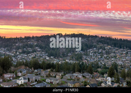 Colorful sunset sky over Happy Valley Oregon residential suburban neighborhood Stock Photo