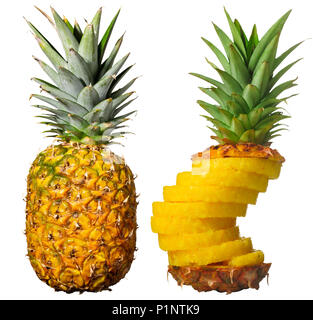 Pineapple whole next to a peeled, sliced and reassembled one. Isolated on white. Stock Photo