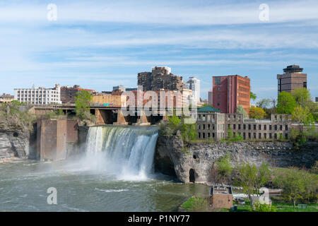 ROCHESTER, NY - MAY 14, 2018: Skyline of Rochester, New York at the High Falls along the Genesee River Stock Photo