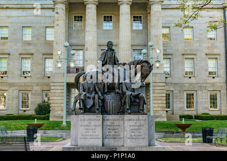 RALEIGH, NC - APRIL 17, 2018: Statue commemorating Presidents James Polk, Andrew Jackson and Andrew Johnson at the North Carolina Capitol Building in  Stock Photo