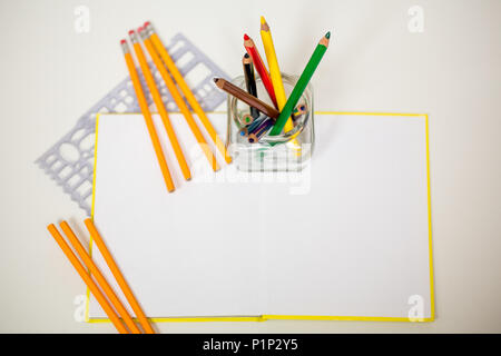 all for children creativity, pencils, scissors, colored paper, there is a place for text Stock Photo