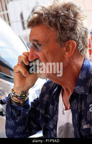 Eddie Jordan chats on the phone at the Monaco Historic Grand Prix  Featuring: Eddie Jordan Where: Monaco, Monaco When: 12 May 2018 Credit: Pat Denton/WENN.com Stock Photo