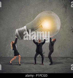 Business people hold a light bulb. concept of new idea and company startup Stock Photo