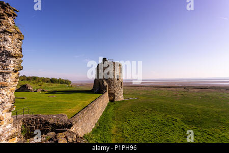 Ruins of Flint castle situated near the seaside in Wales, the United Kingdom on early spring morning Stock Photo