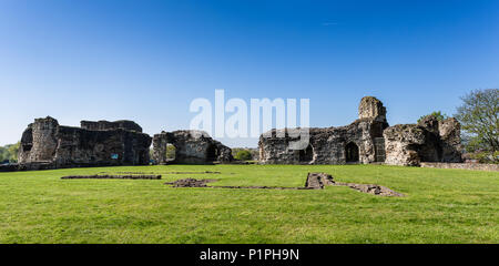 Ruins of Flint castle situated near the seaside in Wales, the United Kingdom on early spring morning Stock Photo