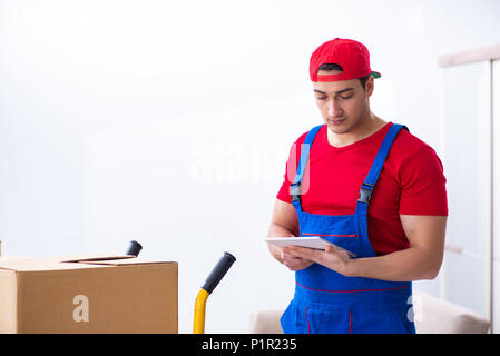Contractor worker moving boxes during office move Stock Photo
