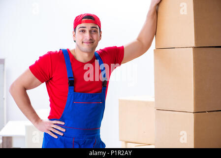 Contractor worker moving boxes during office move Stock Photo