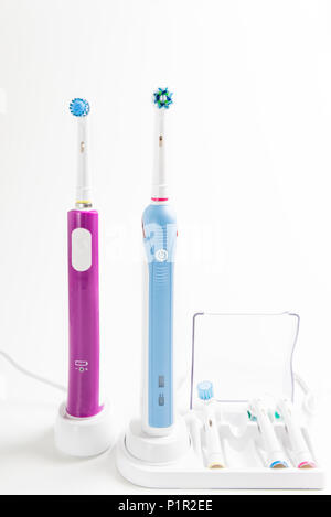Electric Rechargeable Toothbrushes for the family on light background Stock Photo