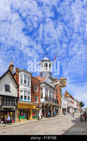The iconic Guildhall with its distinctive clock in High Street, Guildford, county town of Surrey, southeast England, UK on a sunny summer's day Stock Photo