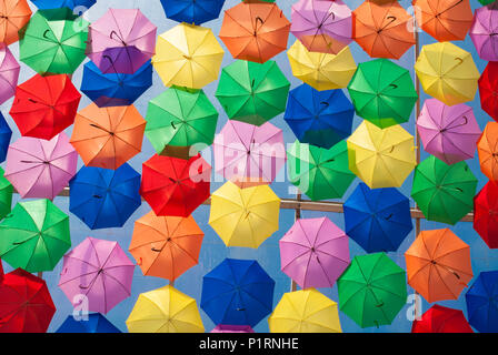 Colourful umbrellas in the street