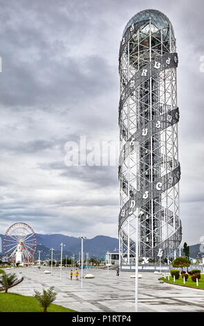 BATUMI, GEORGIA – OCTOBER 3, 2017: Alphabetic Tower and Ferris wheel in Batumi, Georgia. Stock Photo