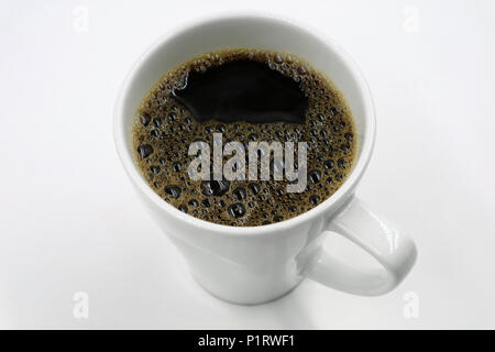 Top view of a cup of freshly brewed coffee isolated on white Stock Photo