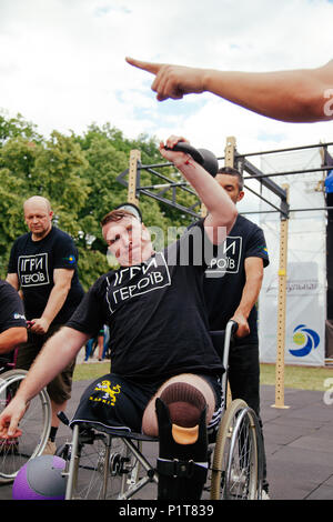 under the brand name 'games for heroes' - the stage of the sports crossfit of all Ukrainian competitions for veterans of the war in Kharkov on June 9, Stock Photo