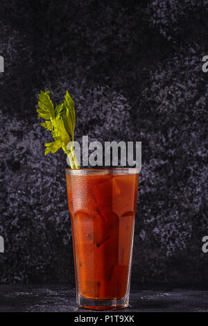 Classic cocktail - Bloody Mary on a dark background. Stock Photo