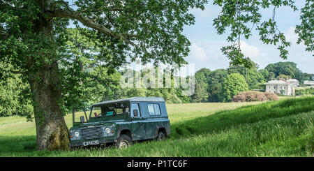 landrover parked in grounds of country house Boconnoc Stock Photo