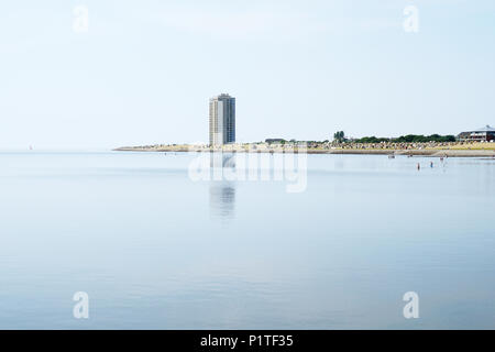 tourist town Buesum on the north sea coast in Germany, panoramic view with beach and skyscraper Stock Photo