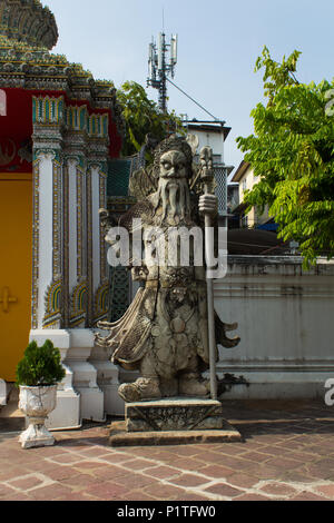 Bangkok, Thailand - January 2014: Chinese guardian stone statue in Wat Pho Temple in Bangkok Thailand Stock Photo