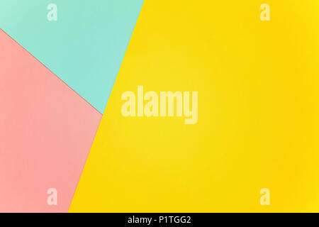 Blue, yellow and pink pastel color paper geometric flat lay background Stock Photo