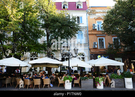 Derybasivska Street is a pedestrian street in Odessa. Many popular cafes and restaurants are line along this colorful street. Stock Photo