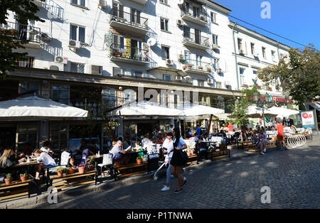 Derybasivska Street is a pedestrian street in Odessa. Many popular cafes and restaurants are line along this colorful street. Stock Photo