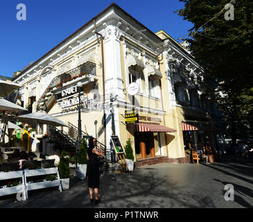 Derybasivska Street is a pedestrian street in Odessa. Many popular cafes and restaurants are line along this colorful street. Stock Photo