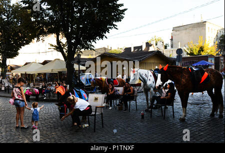 Derybasivska Street is a pedestrian street in Odessa. Many popular cafes and restaurants are line along this colorful street. Stock Photo