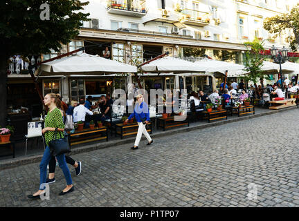 Derybasivska Street is a pedestrian street in Odessa. Many popular cafes and restaurants are line along this colorful street. Stock Photo