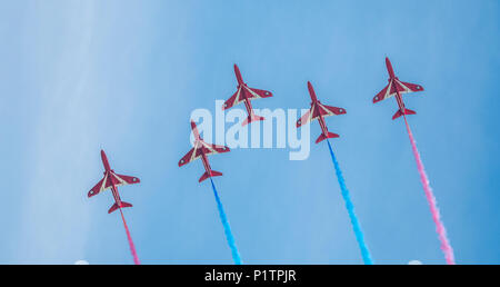 RAF Red Arrows perform over RAF Cosford during Cosford Airshow 2018. Red 1 smoke did not work throughout the show. Stock Photo