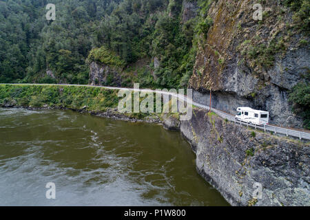 Campervan at Hawks Crag, and Buller River, Buller Gorge, State Highway 6 near Westport, West Coast, South Island, New Zealand - drone aerial Stock Photo