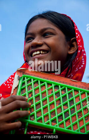 Portrait of a maktab student. Maktab an Arabic word meaning schools for teaching children in elementary Islamic subjects. Dhaka, Bangladesh. Stock Photo