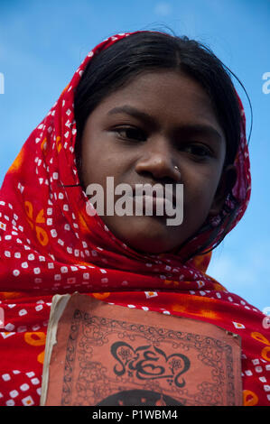 Portrait of a maktab student. Maktab an Arabic word meaning schools for teaching children in elementary Islamic subjects. Dhaka, Bangladesh. Stock Photo