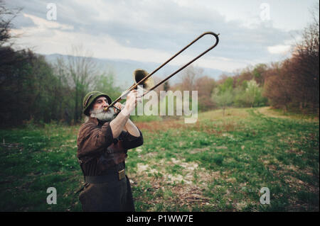 A portrait of an elderly man in the forest Stock Photo