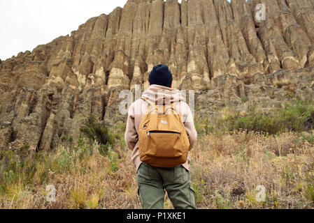 Admiring Valle de las Animas; nature designed wonderful clay mountains carved by erosion, rain, winds and sun. La Paz, Bolivia. Stock Photo