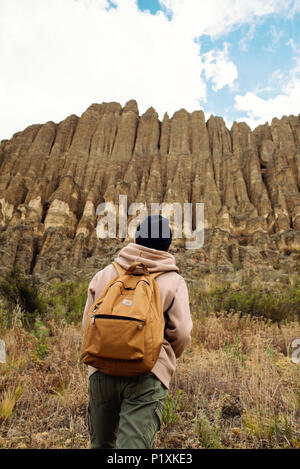 Admiring Valle de las Animas; nature designed wonderful clay mountains carved by erosion, rain, winds and sun. La Paz, Bolivia. Stock Photo