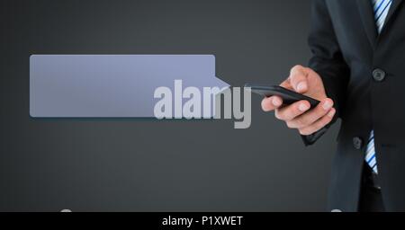Man using phone with chat bubble Stock Photo