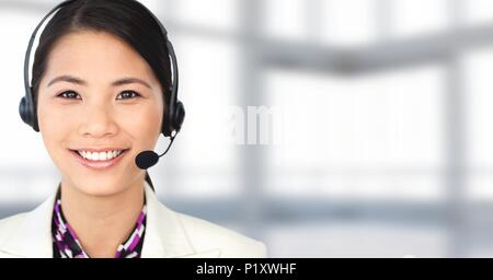 Customer service woman with bright background in call center Stock Photo