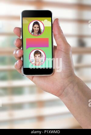 Messaging App on phone in hand with chat profiles Stock Photo