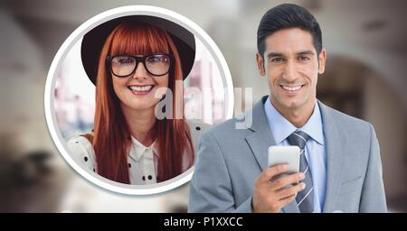 Man holding phone with woman in messaging profile picture Stock Photo