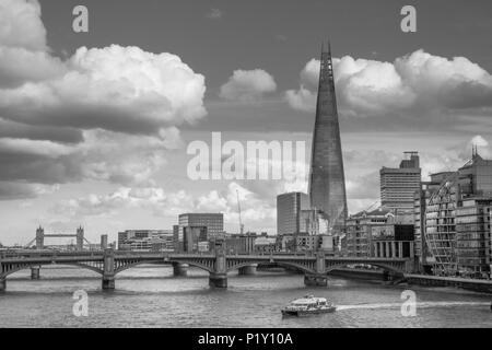 London, a nice widen angle contemporary view in black and white looking east toward the Shard and tower bridge from millennium bridge in spring Stock Photo