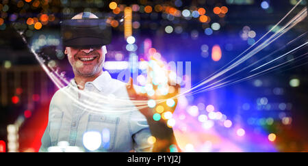 Composite image of man using an oculus Stock Photo