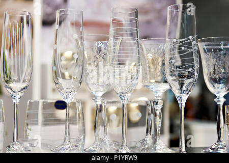 Wine glasses for wine and champagne on table Stock Photo