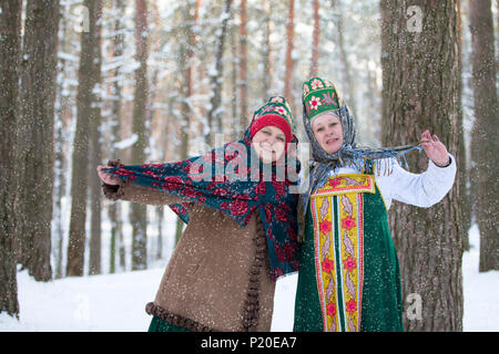 Belarus, Gomel, February 18, 2018. Russian holiday seeing off winter Maslenitsa.Russian women in national clothes in the winter forest Stock Photo
