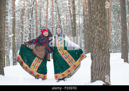 Belarus, Gomel, February 18, 2018. Russian holiday seeing off winter Maslenitsa.Russian women in national clothes in the winter forest Stock Photo