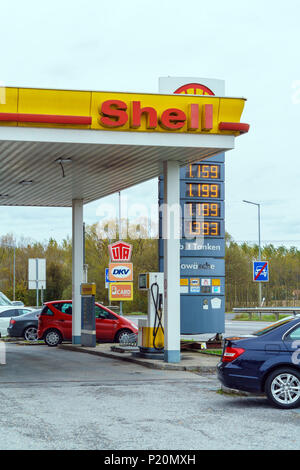 Graz, Austria - October 23, 2017: Refueling Shell with cars that came for gasoline Stock Photo