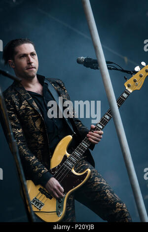 Norway, Bergen - June 12, 2018. The American rock band Queens of the Stone Age performs a live concert during the Norwegian music festival Bergenfest 2018 in Bergen. Here bass player Michael Shuman is seen live on stage. (Photo credit: Gonzales Photo - Jarle H. Moe). Credit: Gonzales Photo/Alamy Live News Stock Photo