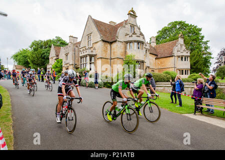 Day two of the Grand Depart from Rushden, Northamptonshire of the OVO Energy Women's Cycle Tour 2018. The cyclists depart from Hall Park in the centre of Rushden past Rushden Hall. Credit: GLC Pix/Alamy Live News: Rushden, UK. 14th June 2018. Stock Photo