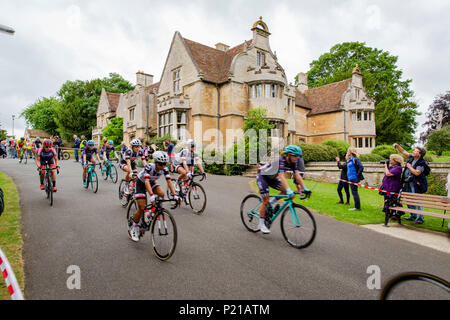 Day two of the Grand Depart from Rushden, Northamptonshire of the OVO Energy Women's Cycle Tour 2018. The cyclists depart from Hall Park in the centre of Rushden past Rushden Hall. Credit: GLC Pix/Alamy Live News: Rushden, UK. 14th June 2018. Stock Photo