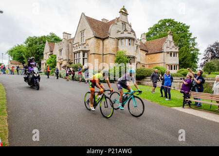 Day two of the Grand Depart from Rushden, Northamptonshire of the OVO Energy Women's Cycle Tour 2018. The cyclists depart from Hall Park in the centre of Rushden past Rushden Hall. Credit: GLC Pix/Alamy Live News: Rushden, UK. 14th June 2018. Stock Photo