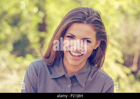 Portrait of a smiling happy woman Stock Photo