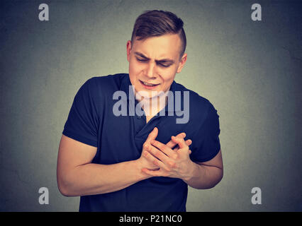 Man having chest pain heart attack Stock Photo